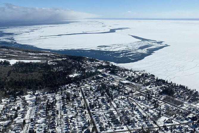 60-Mile Ultimate Helicopter Tour over Duluth and Lake Superior's North Shore - Following the St. Louis River toward the city