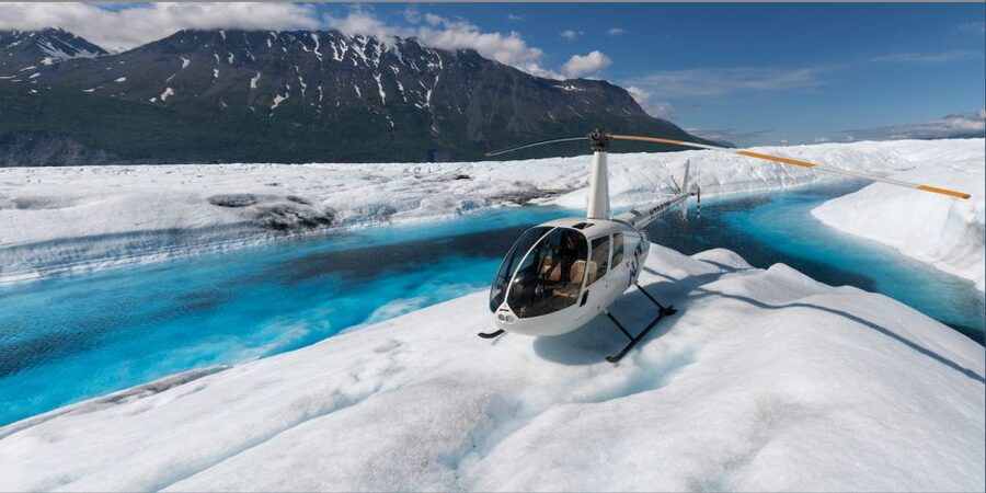 Anchorage: Knik Glacier Helicopter Tour with Landing - The return flight over glacial rivers