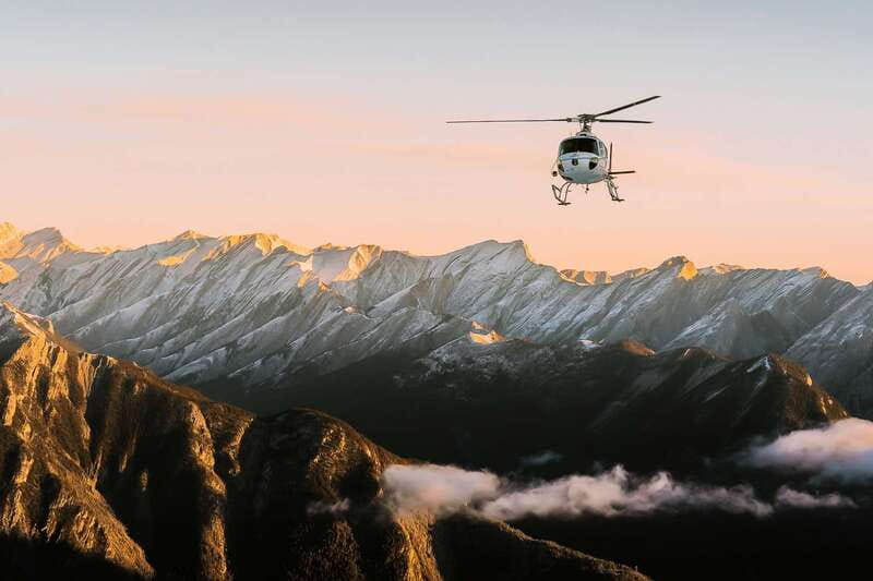 Canadian Rockies: Abraham Lake Ice Bubbles Helicopter Tour - Walking on Abraham Lake to see the ice bubbles