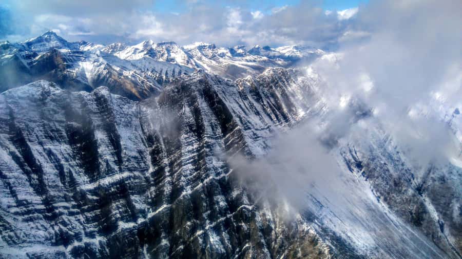 Canmore: 25-Minute Three Sisters Helicopter Tour - Small groups, weather, and practical limits