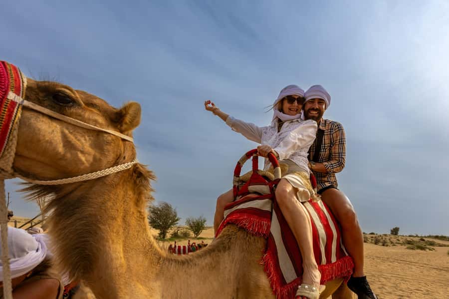 Dubai: Helicopter Ride, Desert Safari, Camels & Refreshments - Optional quad biking across the red dunes