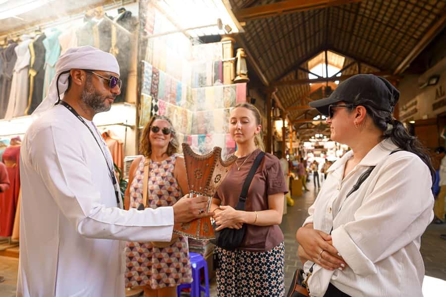 Dubai: Helicopter Ride, Old Town Walking Tour, Abra & Snacks - The essential details at a glance