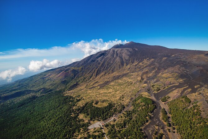 Etna: Group Helicopter Flight (30 Minutes from Fiumefreddo) - Towns, volcanic slopes, and changing scenery