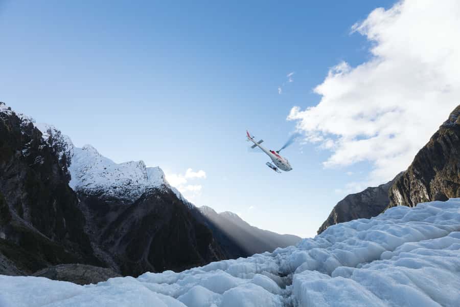 Franz Josef: 2.5 Hour Glacier Hike with Helicopter Transfer - Guides, stories, and group pace