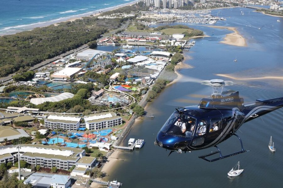 Gold Coast: Sea World and Broadwater Scenic Helicopter Tour - Climbing over Broadwater toward the coast