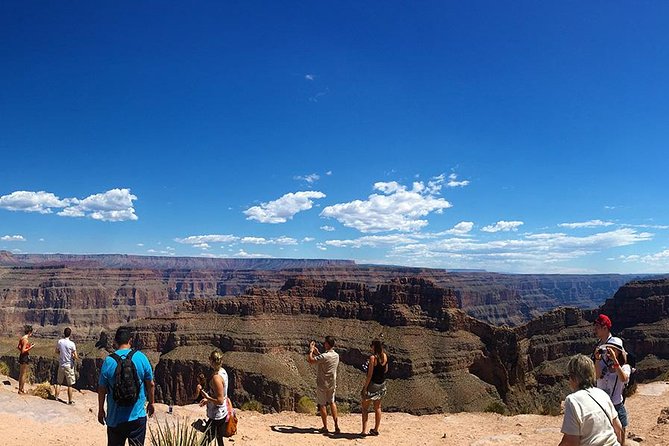 Grand Canyon Helicopter and Western Ranch Adventure Landing Tour - Flying below the Grand Canyon’s West Rim