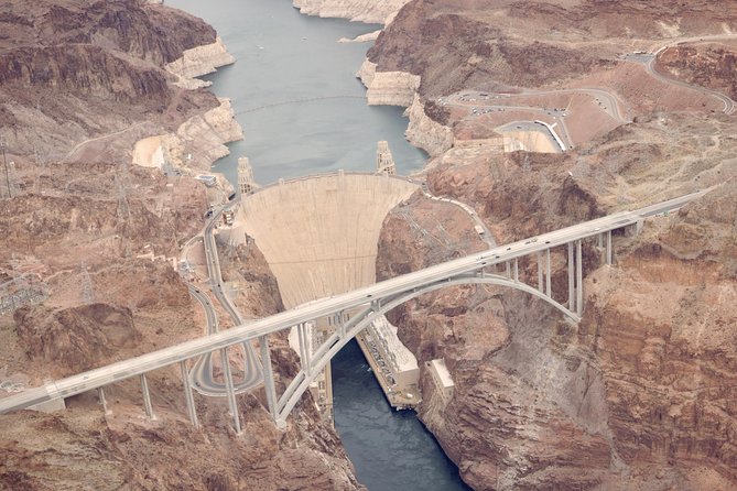 Grand Canyon Helicopter Tour and River Raft or Emerald Cave Kayak - Flying below the Grand Canyon rim