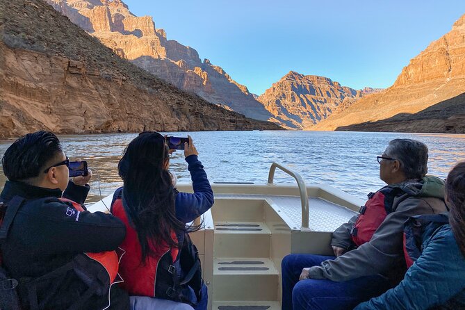 Grand Canyon West Helicopter Tour with VIP Skywalk and Boat Ride - Grand Canyon West from above and below