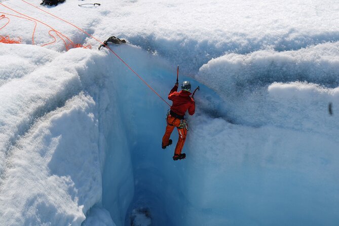 Heli Glacier Crevasse Ice Climbing- Summer - Inside a glacial moulin