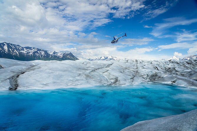 Helicopter and Glacier Paddle Boarding -PRIVATE - Landing On Ice With Micro-Spikes