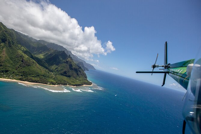 Kauai Deluxe Waterfall Safari: Helicopter Tour - Photographing from the helicopter