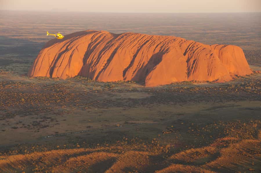 Lake Amadeus, Uluru & Kata Tjuta Helicopter Tour - Searching for camels across the desert