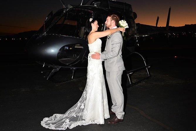 Las Vegas Night Flight Helicopter Wedding Ceremony - Flowers, minister, and the ceremony setup