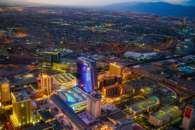 Las Vegas Strip Highlights by Helicopter at Night - What the Strat and Fremont Street add