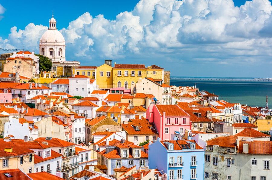 Lisbon: Guided Bike Tour, Helicopter Flight, and Boat Trip - Returning by boat on the Tagus