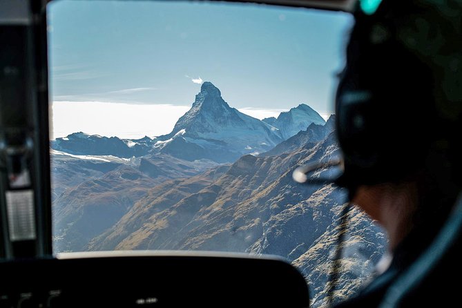 Matterhorn helicopter tour - longest scenic flight from Bern over the Swiss Alps - Oeschinensee and the colour of Alpine water