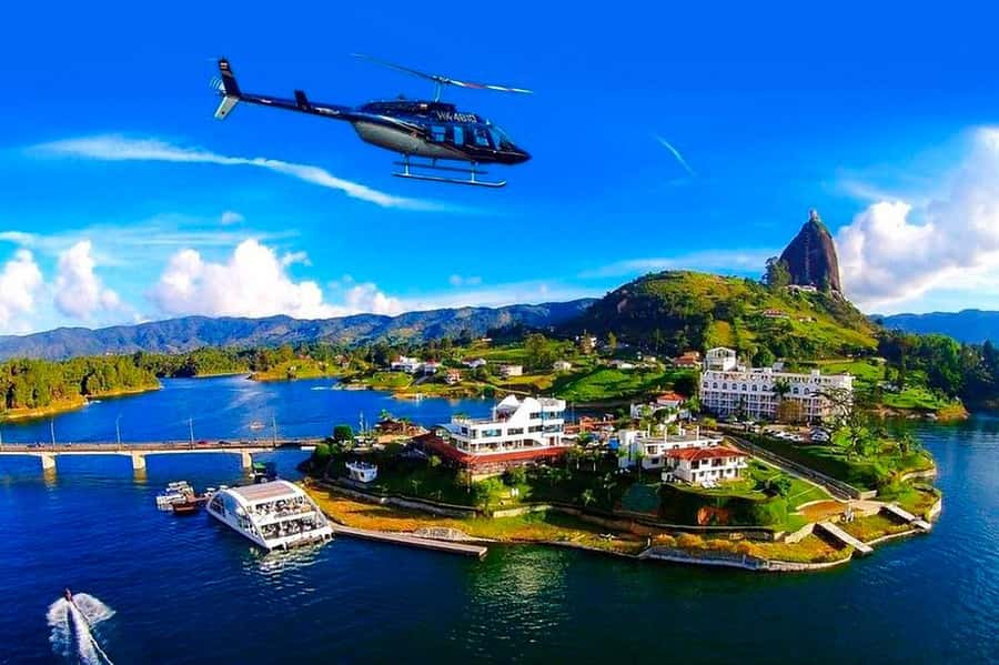 Medellín: Guatapé Private Tour with Helicopter & Boat Ride - Leaving Medellín in a private vehicle