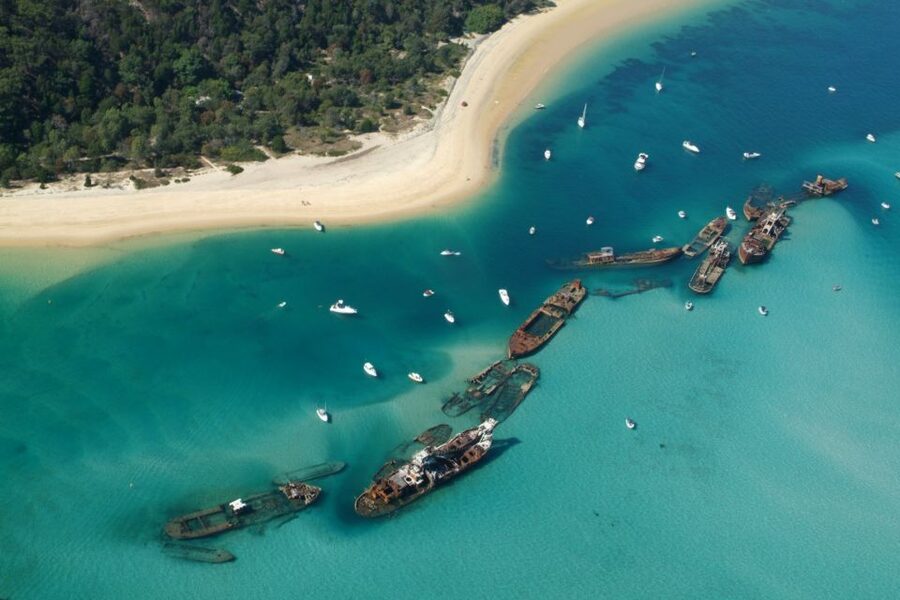 Moreton Island: Tangalooma Snorkel Tour with Helicopter Tour - Sunset drinks and the wild dolphin viewing