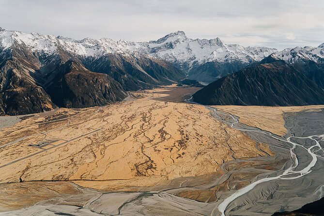 Mount Cook: Mountains High 40-Minute Helicopter Flight - Weather, sound, and seating concerns