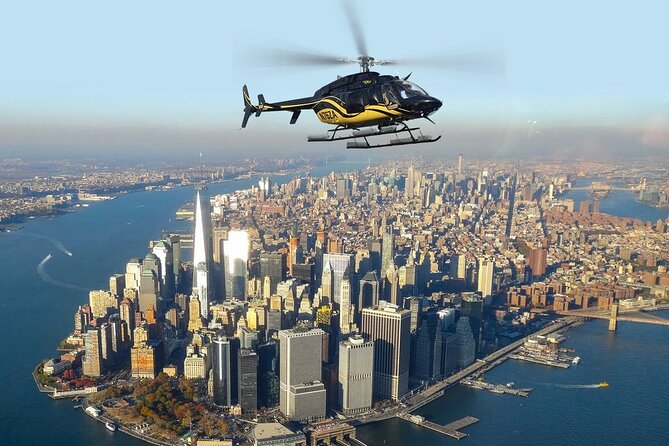 New York City Helicopter Tour at Night - The Statue of Liberty and Ellis Island from above
