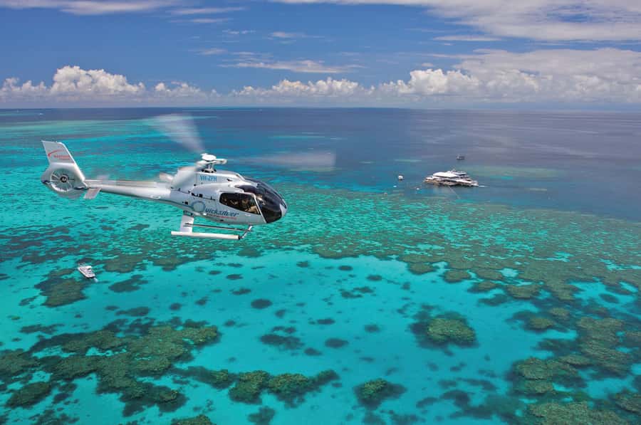 Port Douglas: Outer Barrier Reef Cruise & 10 Min Helicopter - Leaving Port Douglas aboard the Quicksilver catamaran