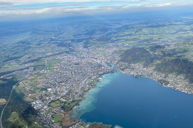 Private helicopter flight to Stockhorn mountain, with view to the Swiss Alps - Flying over Emmental and its dairy country