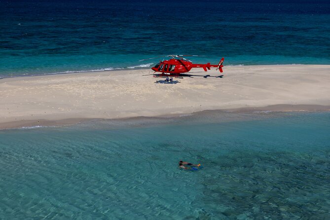 Private Helicopter Tour: Reef Island Snorkeling and Gourmet Picnic Lunch - Arriving at Nautilus Aviation