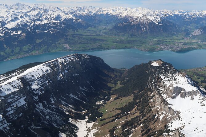 Private helicopter tour to the Swiss Alps - see the Eiger, Monch and Jungfrau - The turquoise water of Lake Thun