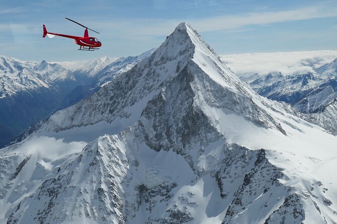 Private Swiss Alps helicopter tour over snow covered mountain peaks and glaciers - Why a private helicopter changes the Alpine view