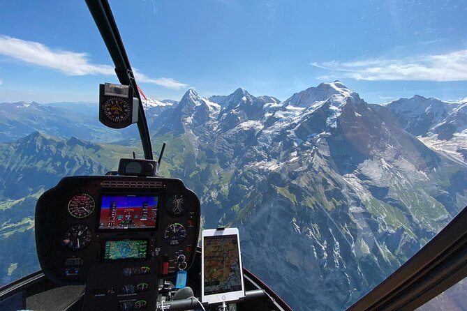Private Swiss Alps helicopter tour over snow covered mountain peaks and glaciers - Schilthorn, Bond history, and Lauterbrunnen