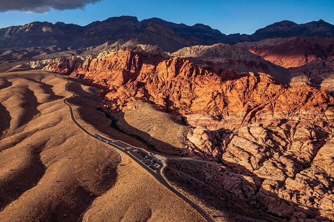 Red Rock Canyon Helicopter Tour with Landing and Champagne Toast - Returning over Bellagio, Caesars Palace, and Allegiant Stadium