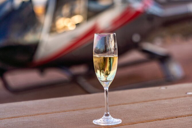 Red Rock Canyon Helicopter Tour with Landing and Champagne Toast - Booking, timing, and cancellation details