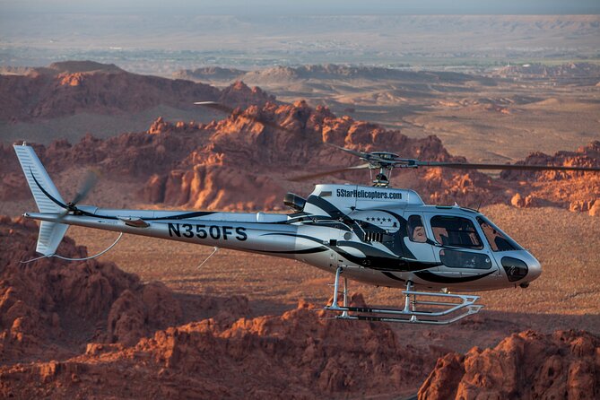 Valley of Fire Helicopter Tour and Landing with Champagne Toast - The return over Bellagio, Caesars Palace, and the STRAT