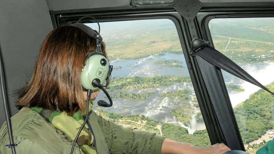 Victoria Falls: Helicopter Flight Aerial View of The Falls - Taking off over the Zambezi River