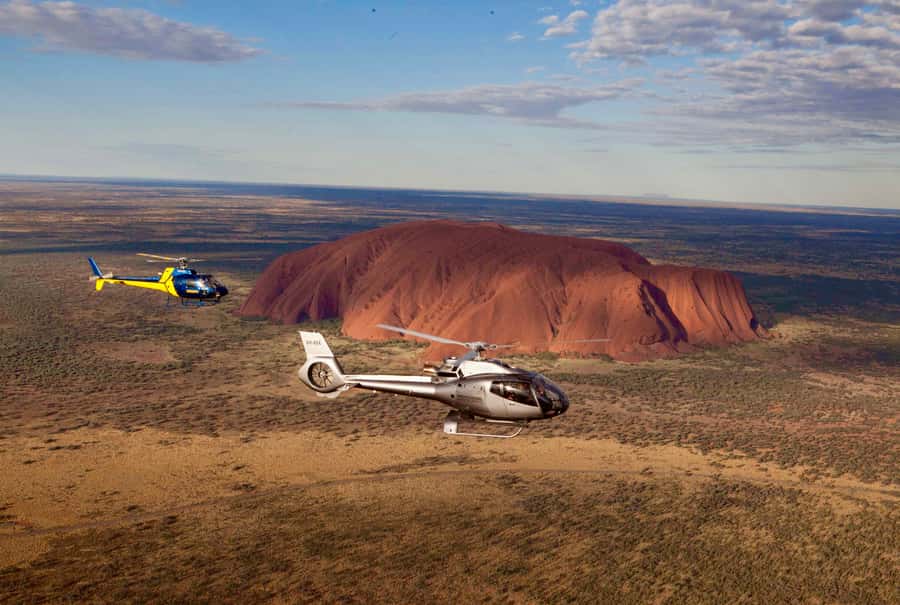 Yulara: Uluru and Kata Tjuta Sunset Helicopter Tour - Heading toward Uluru and Kata Tjuta